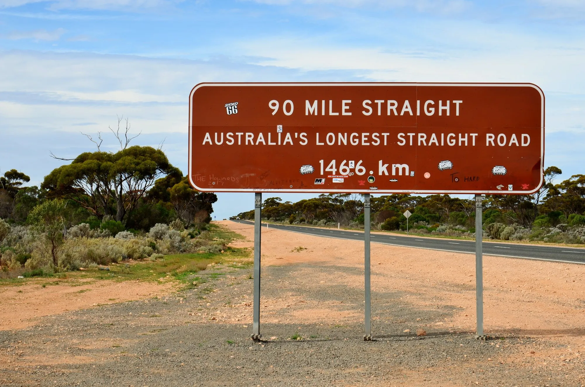 The 90 Mile Straight sign near Balladonia: Australia's longest straight road, 146.6 km