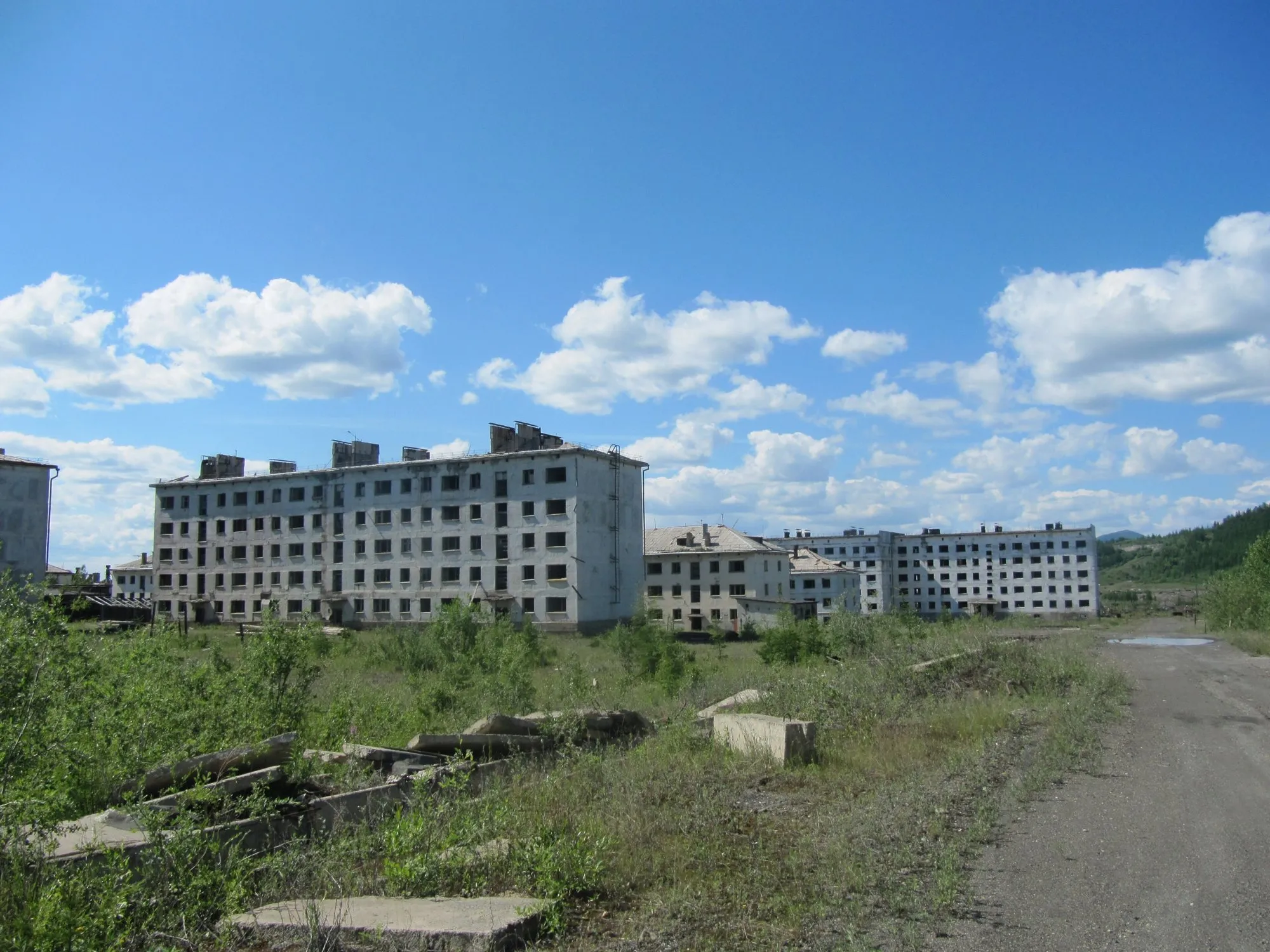Empty five-storey apartment blocks in the abandoned town of Kadykchan